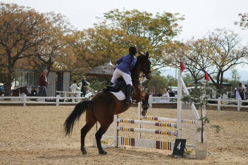 Showjumping in an outdoor arena